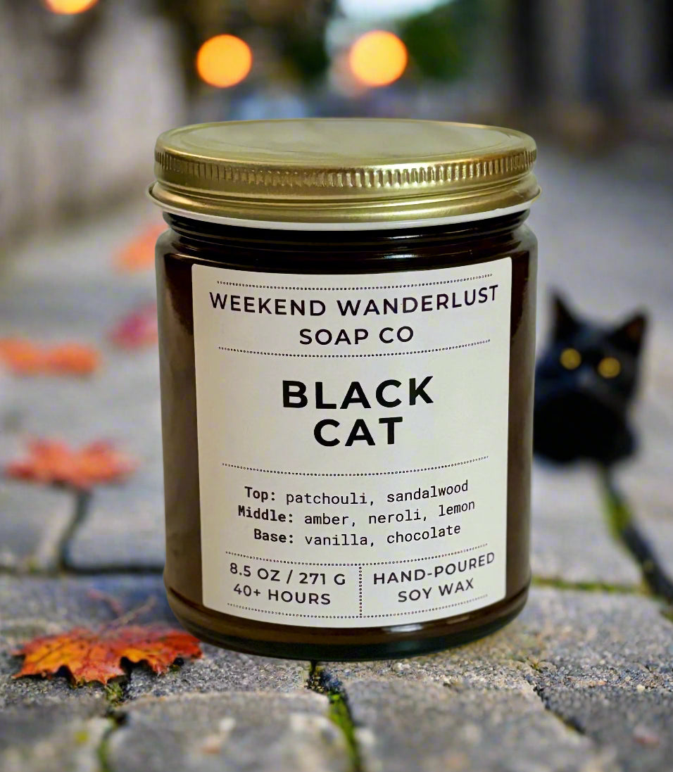 Jar of 'Black Cat' candle from Weekend Wanderlust Soap Co on a light background