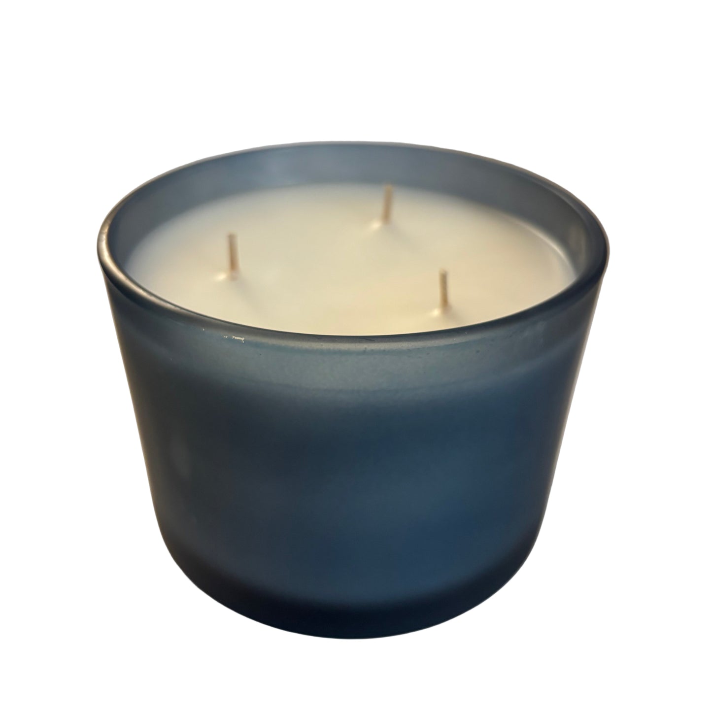 Dark blue candle with wicks on a white surface